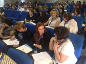 Working with partners during one of the morning session activities.